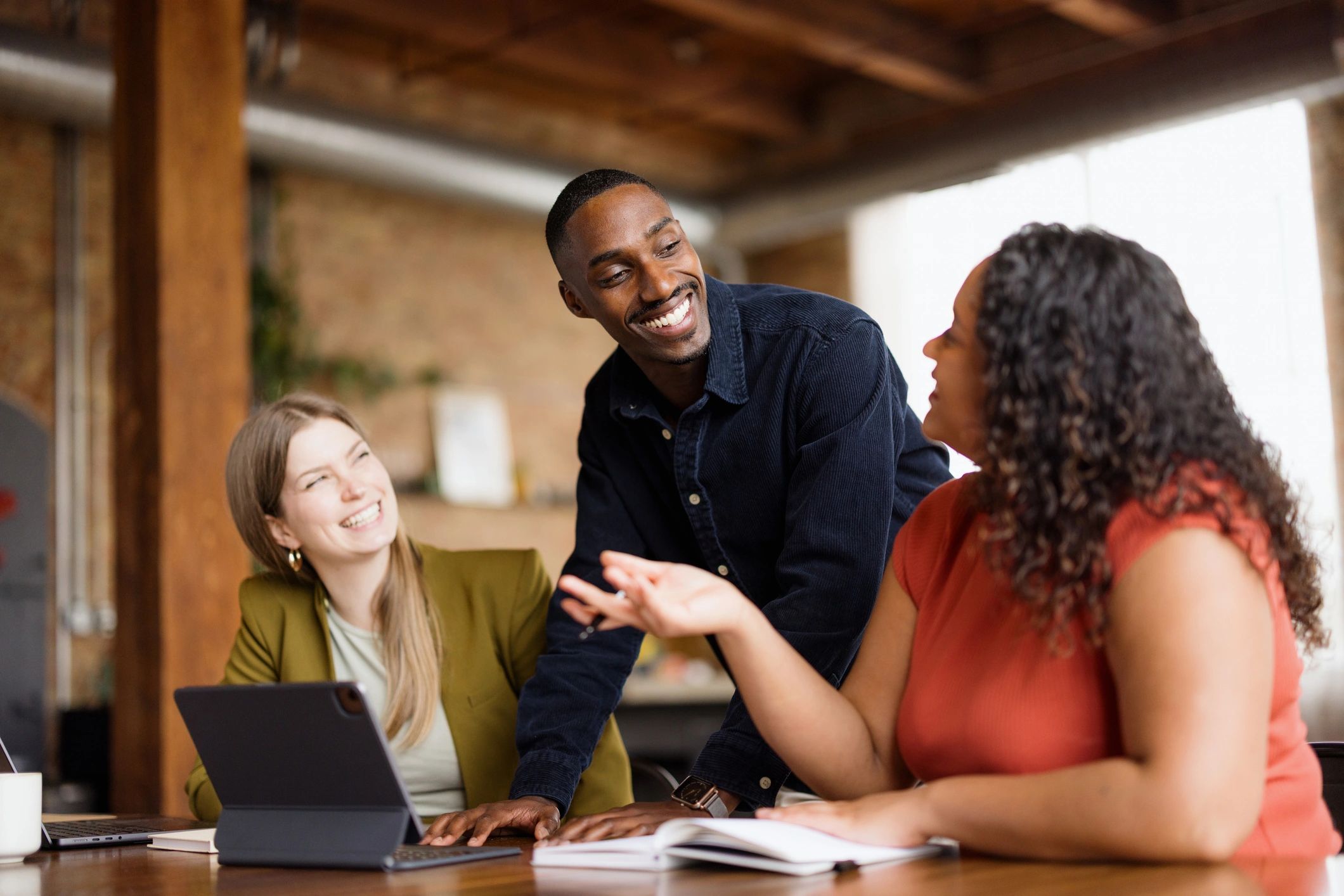 Technology professionals collaborating in a business meeting